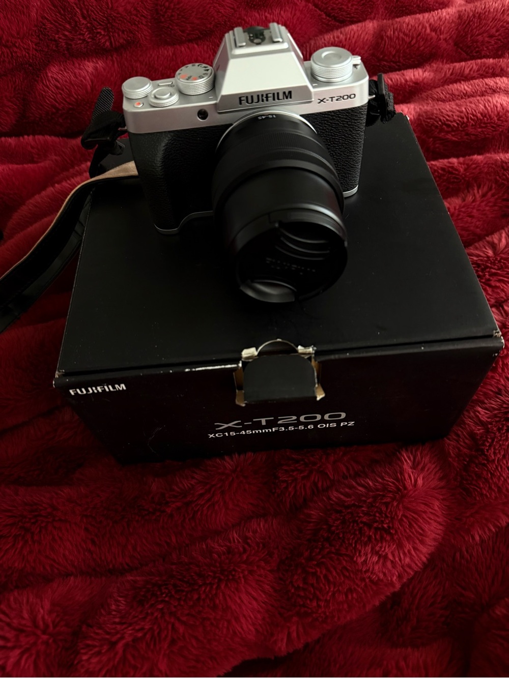 Fujifilm X-T200 Silver and Black Mirrorless Camera with Attached Zoom Lens